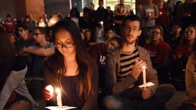 People attending vigil