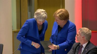 Theresa May and Angela Merkel