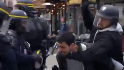 Eyewitness account of a man later identified as Alexandre Benalla attacking protesters.