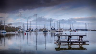 Flood waters from Lough Neagh leave the jetty at Kinnego Marina submerged