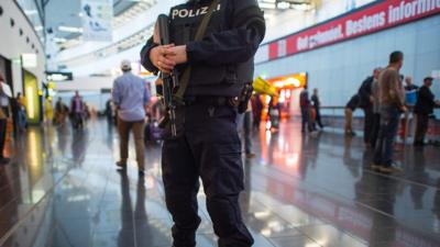 A police officer with a gun