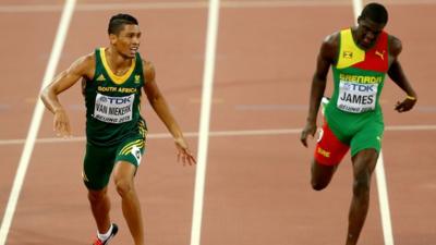 South African Wayde Van Niekerk wins the 400m ahead of third-placed Kirani James at the World Athletics Championships in Beijing