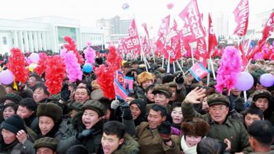 Crowds cheers at an opening ceremony in Samjiyon, North Korea