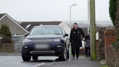 Rhian and Harley walking in the street