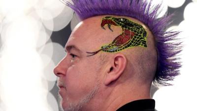 Peter Wright credits his family and hairdo for his first PDC World Championship title.