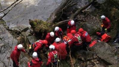 Rescuers help injured kayaker