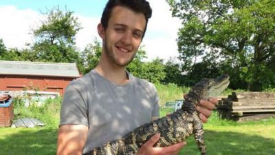 Jordan with a reptile