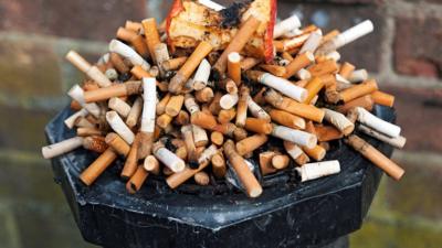 Image of a full ashtray full of butts