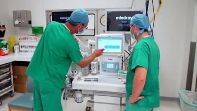 Staff in an operating theatre