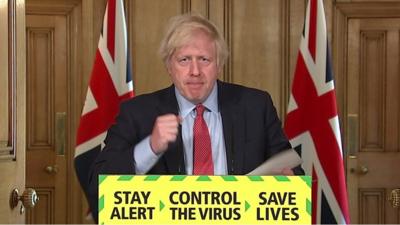 Boris Johnson giving daily briefing