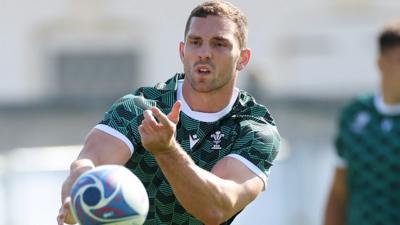 Goerge North passes the ball in Wales training