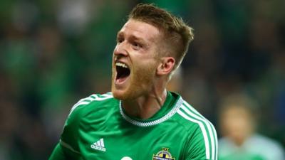 Steven Davis celebrates one of his two goals in the 3-1 win over Greece which secured Northern Ireland's Euro 2016 qualification