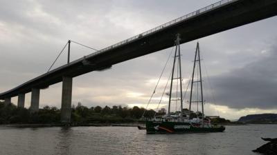 Greenpeace ship Rainbow Warrior sails under Erskine Bridge