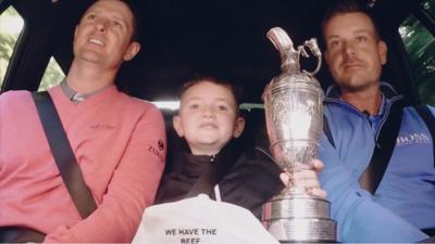 Justin Rose, nine-year-old Aaron and Henrik Stenson