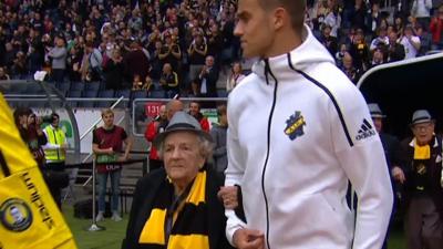 AIK players walk out with some of their oldest fans