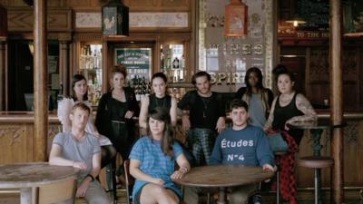 young people in a pub