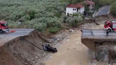 Bridge collapsed with car fallen into river below in Greece