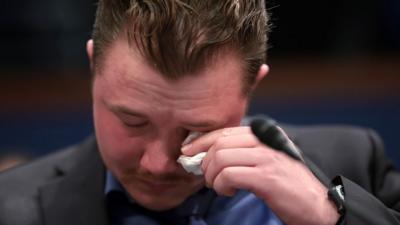 Sgt Tyler Vargas-Andrews holding a tissue to his eye