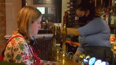 Woman in pub