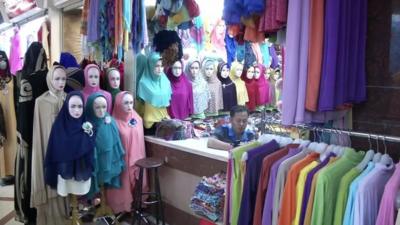 Shop selling colourful scarves
