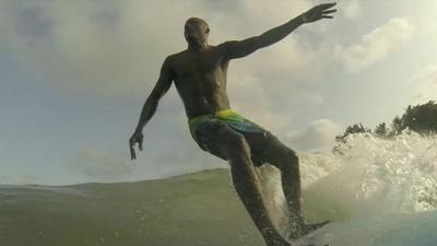 Godpower Pekipuma surfing in Lagos