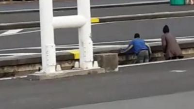 Migrants on train track at Calais