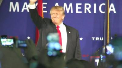 Donald Trump greets supporters