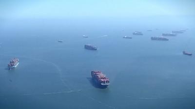 Queue cargo ships near Oakland, California