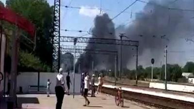 Smoke rising in the background of village in Crimea