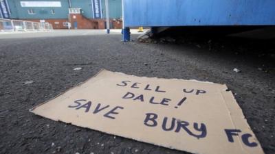 Bury FC sign