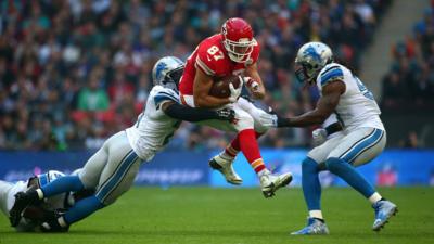 Kansas City Chiefs tight end Travis Kelce is tackled