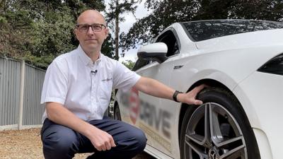 Driving instructor Howard Floyd with car