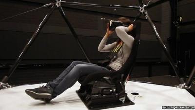 A person in a virtual reality simulator