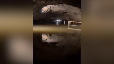 Flooding inside Peak Cavern, Derbyshire, known as the "Devil's Arse"