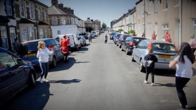 People dancing in the street