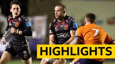 Jamie Roberts of Dragons takes on Luke Crosbie of Edinburgh