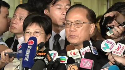 Donald Tsang outside court