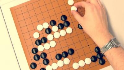 A man playing Go