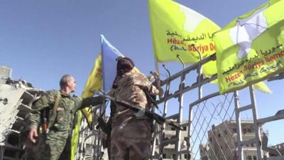 Syrian Democratic Forces (SDF) gathering at the infamous al-Naim square in Raqqa