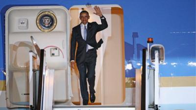 US President Barack Obama steps off Air Force One upon arrival at Stansted Airport