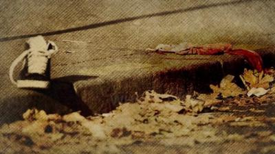 Shoe and bloodied rag outside the Bataclan, 14 November 2015