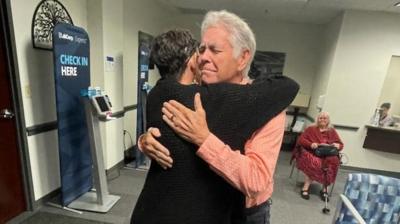 Father and daughter share embrace