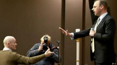 Boston and Skegness MP Matt Warman meets an angry constituent at a public meeting.