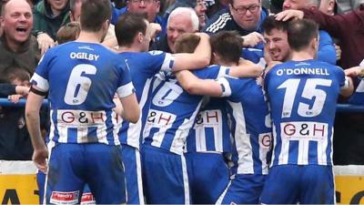 Coleraine players celebrate victory over Linfield