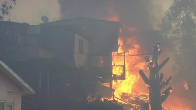 Fire engulfs a house in Valparaíso