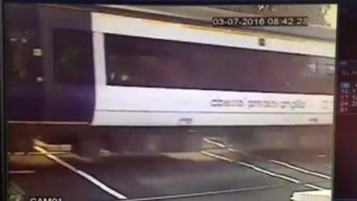 Train and family in near miss