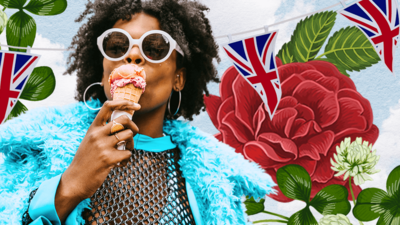 A woman wearing sunglasses and eating an ice cream