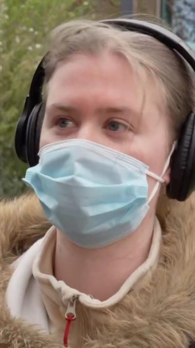A female student wearing a mask