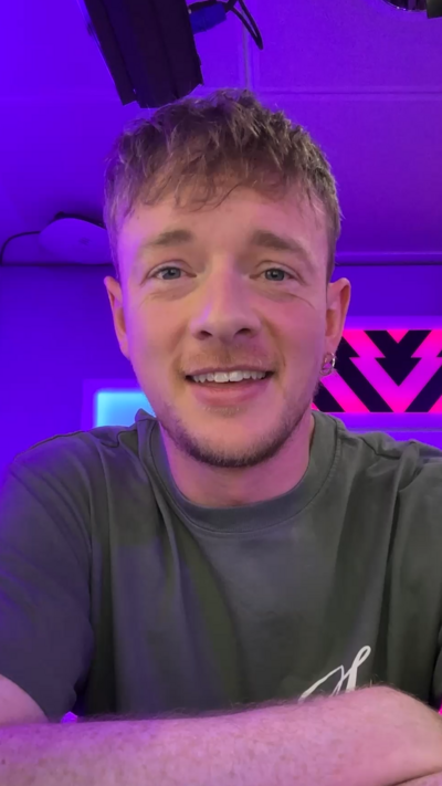 Calum from Newsbeat on Radio 1. He has short hair and is looking directly at the camera