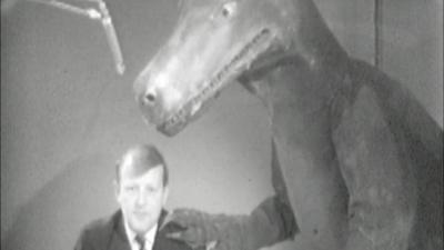 Robert Robinson with a large monster model